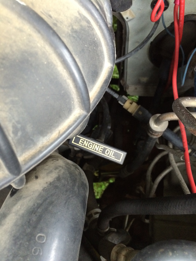 How to identify the Engine oil dipstick