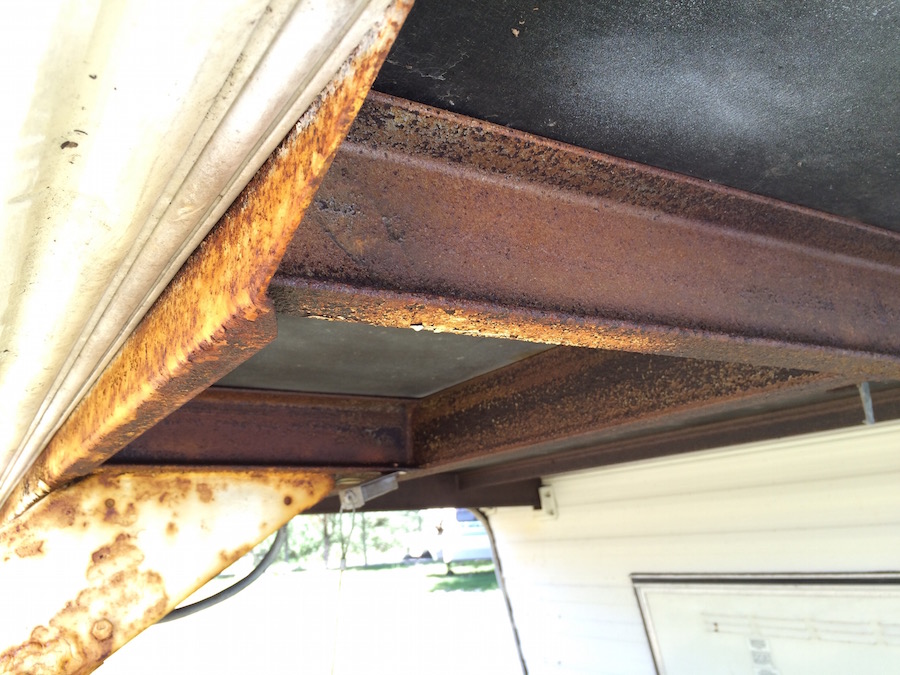 This picture shows bad rust on a frame of a 5th wheel trailer. This vehicle has been kept in a coastal environment which has caused it to deteriorate quickly.